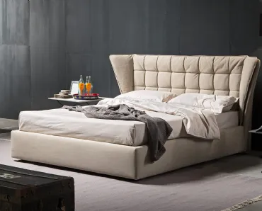 Letto matrimoniale con testiera imbottita morbida e avvolgente trapuntata a quadri e comodo box contenitore Flower di Novaluna