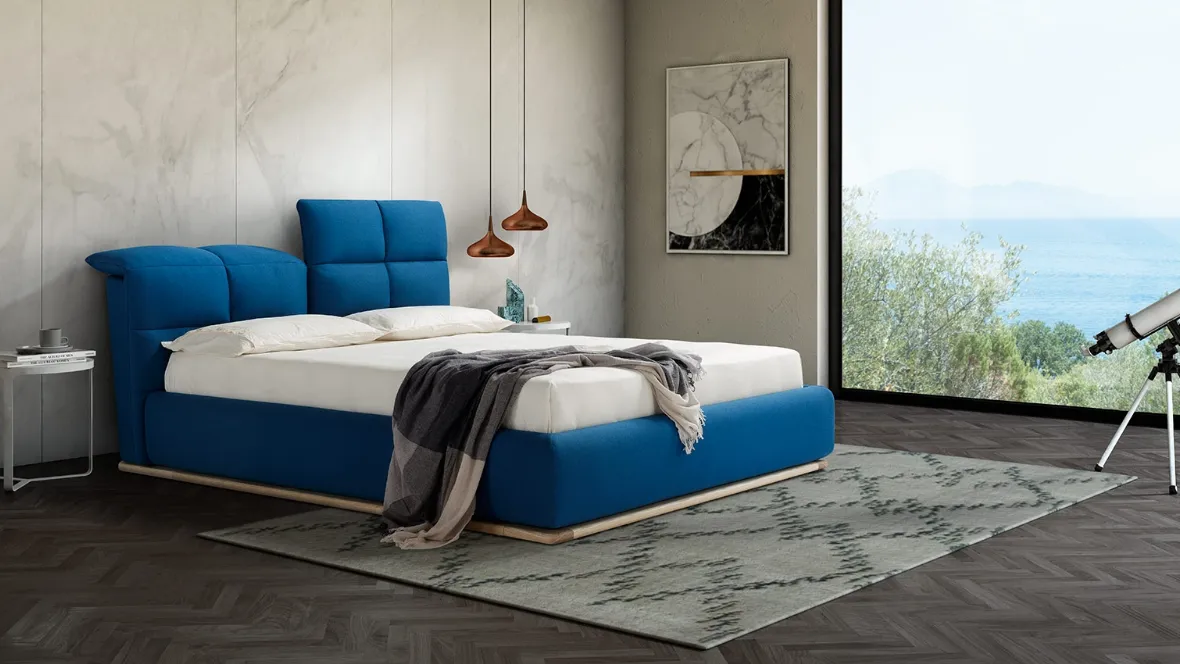 Letto matrimoniale imbottito con testiera sdoppiata che diventa un poggiatesta regolabile e box contenitore Miami di Novaluna