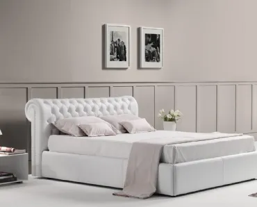 Letto in pelle imbottito con testiera lavorazione capitonnè dalle linee classiche con box contenitore Royal di Novaluna